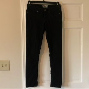 Black skinny jeans mid-rise
